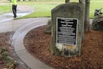 A memorial stands in memory of those lost and wounded on the day of the shooting at Thurston High School 20 years ago. Days before the 20th anniversary, maintenance crew workers cleaned the memorial.