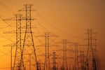 A view of high voltage transmission towers in Houston, Texas. Millions of Texans lost their power when winter storm Uri hit the state and knocked out coal, natural gas and nuclear plants that were unprepared for the freezing temperatures brought on by the storm. Wind turbines that provide an estimated 24 percent of energy to the state became inoperable when they froze. (Photo by Justin Sullivan/Getty Images)