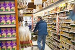 Shoppers stock up on supplies at New Seasons in Southeast Portland's Sellwood neighborhood, Feb. 20, 2018 as a snowstorm moves into the city.