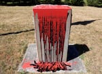 Two stone markers honoring Jefferson Davis in Clark County were discovered covered in black and red paint Friday morning.