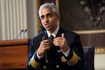 Surgeon General Dr. Vivek Murthy speaks during an event on the White House.