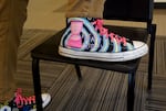 David Douglas High School theater teacher Michael Givler wears shoes decorated by students in honor of this year’s school musical “Freaky Friday”. The themed shoes are an annual tradition, starting with the school’s production of “Mary Poppins” in 2016.