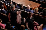 Oregon House Democratic members Andrea Salinas and Maxine Dexter walk out as President Donald Trump addresses a joint session of Congress in the House chamber at the U.S. Capitol in Washington, Tuesday, March 4, 2025.