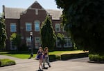 People walk on the University of Portland campus .