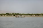 Fishermen seek their catch down a stretch of the Indus River near the southern Pakistani town of Sehwan.