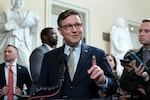 Speaker of the House Mike Johnson, R-La., talks to reporters after passing the funding bill to avert the government shutdown at the Capitol in Washington, Friday, Dec. 20, 2024.