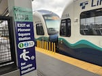 A sign at the Northgate light rail station directs travelers headed to the 2026 World Cup in Seattle.