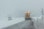 A snowplow clears a path on Highway 26 near Government Camp, Oregon, in this Jan. 9, 2024 file photo.