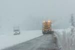 With a winter storm front rolling into the region Tuesday night, travelers in the Cascades can expect to see snowplows on the roadways like this one clearing a path on Highway 26 near Government Camp, Oregon, in this Jan. 9, 2024 file photo.