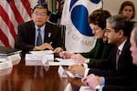 Transportation Secretary Norman Mineta (left) meets with the CEOs of major U.S. airlines, including U.S. Airways CEO Rakesh Gangwal (right), and Federal Aviation Administration Director Jane Garvey on Nov. 15, 2001, at the Department of Transportation in Washington, D.C. Mineta called the meeting to discuss improvements in airport security.