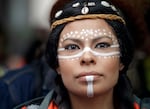 Dr. Leslie Jimenez, Hopi Nation member and descendent of Mexican and Ethiopian indigenous peoples, wears traditional celebratory face paint as she attends an Indigenous Peoples Day blessing and rally in Seattle in 2018.