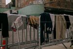 Clothing — washed inside the Brooklyn facility's two shower units — hangs to dry.