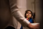 Rumley plays a counting game to encourage Lorelei to brush her teeth.
