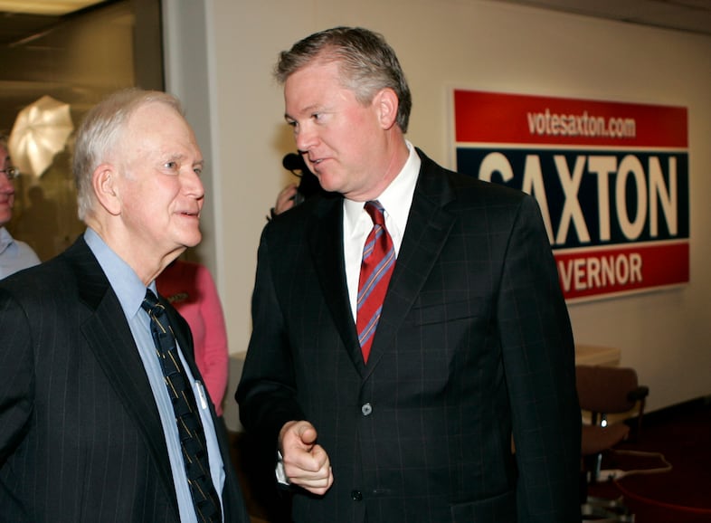 Oregon Republican gubernatorial candidate Ron Saxton, right, visits with former Sen. Bob Packwood, R-Ore., after a news conference in Portland, Ore., Tuesday, Oct. 31, 2006. Saxton, in the closing days of his campaign, is trying to win independents and other voters who, according to state and national polls, are shunning the Republican Party,