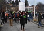 United Academics and supporters march at the Erb Memorial Union on the University of Oregon's Eugene campus, Dec. 5, 2024.