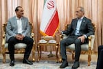 In this photo released by the Iranian Presidency Office, President Masoud Pezeshkian, right, speaks with Pakistan's Army Chief Field Marshal Gen. Asim Munir in Tehran, Iran, Saturday, May 23, 2026.