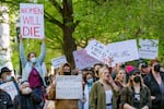 Hundreds gathered in downtown Portland to protest a leaked draft opinion by the U.S. Supreme Court indicating they would vote to overturn Roe v. Wade, Tuesday, May 3, 2022.