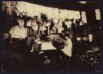 The Ceru family makes artificial leaves in a tenement attic in New York City in January 1912. Modern urban planning was a product of overcrowding in tenement housing projects.