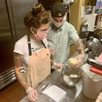 Serena Zendejas and her partner Jake weigh out dough. She spends three nights a week testing recipes and preparing ingredients, and spends the following mornings baking and making deliveries. 