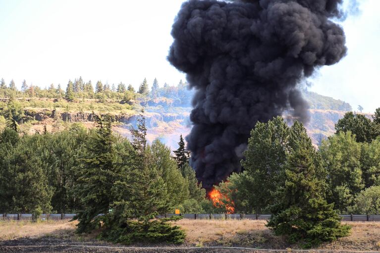 An oil train fire rages on near the bank of the Columbia River on Friday, June 3, 2016.