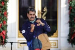 President of Venezuela Nicolás Maduro dances during a march as part of the "Venezuelan Student Day" at Miraflores in Caracas, Venezuela, on Nov. 21.