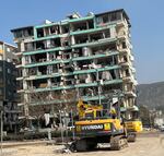 The earthquake left tens of thousands of people dead and destroyed countless buildings, including this one in Antakya, Turkey.
