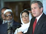 President George W. Bush is seen here on September 17, 2001 during a visit to an Islamic center to try to prevent anti-Muslim sentiment in the wake of the September 11 terrorist attacks.