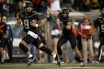 Oregon quarterback Dillon Gabriel (8) runs for a touchdown during an NCAA college football game against Ohio State, Saturday, Oct. 12, 2024, in Eugene, Ore.