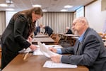 FILE: Senators Sara Gelser Blouin​, left, and Chris Gorsek review paperwork during the 2024 special session in Salem, Ore., at the Oregon state Capitol.