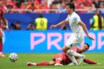 Portugal's Cristiano Ronaldo (7) challenges for the ball with Uzbekistan's Abdukodir Khusanov (2) during the World Cup Group K soccer match between Portugal and Uzbekistan in Houston, Tuesday, June 23, 2026.