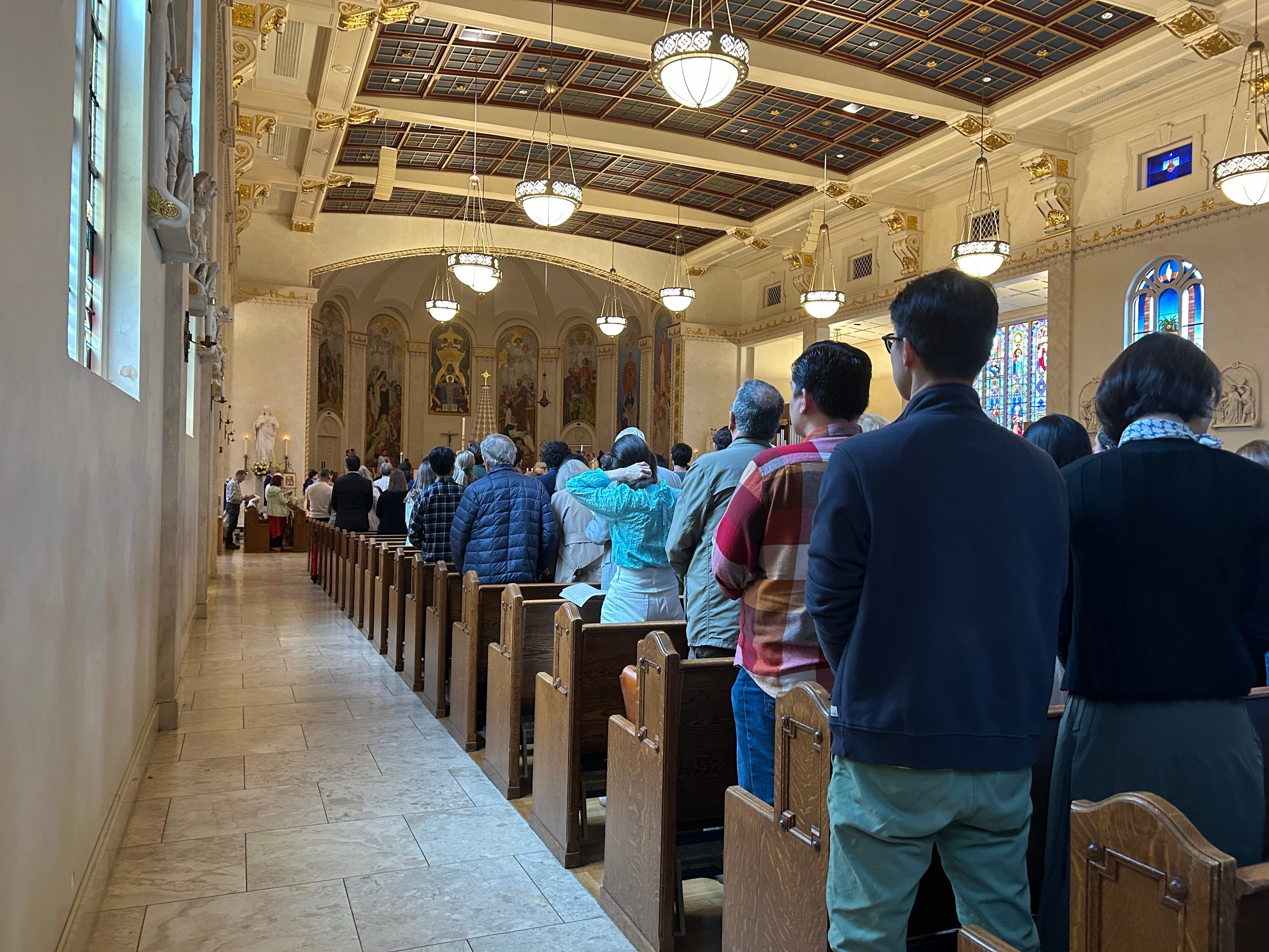 Hundreds gather at St. Mary's Cathedral of the Immaculate Conception in Portland, Ore., on May 11, 2025 to celebrate the election of a new pope, Leo XIV.
