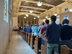 Hundreds gather at St. Mary's Cathedral of the Immaculate Conception in Portland, Ore., on May 11, 2025 to celebrate the election of a new pope, Leo XIV.