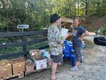 Leigh Raymer turned her farmstand into a food pantry to help neighbors like 68 year old Jeff Tesch, who is without running water and electricity more than a week after the remnants of Hurricane Helene came through the region. She says many people who stop by are uncomfortable asking the government for assistance but will accept help from neighbors they already know and trust.