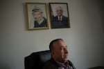 Azmi Abdel Rahman, director of policy with the Palestinian Ministry of Labor, sits for a portrait in his office in Ramallah in the occupied West Bank, on March 24.