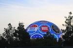 The Sphere concert venue glows after sunset displaying a digital sign to vote Tuesday, Nov. 5, 2024, in Las Vegas, Nev.