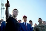 President-elect Donald Trump listens to Elon Musk at the launch of the sixth test flight of the SpaceX Starship rocket Tuesday, Nov. 19, 2024 in Boca Chica, Texas.