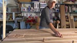 Chinook carver Greg A. Robinson working on a panel for the Portland Art Museum's new Center for Contemporary Native Arts