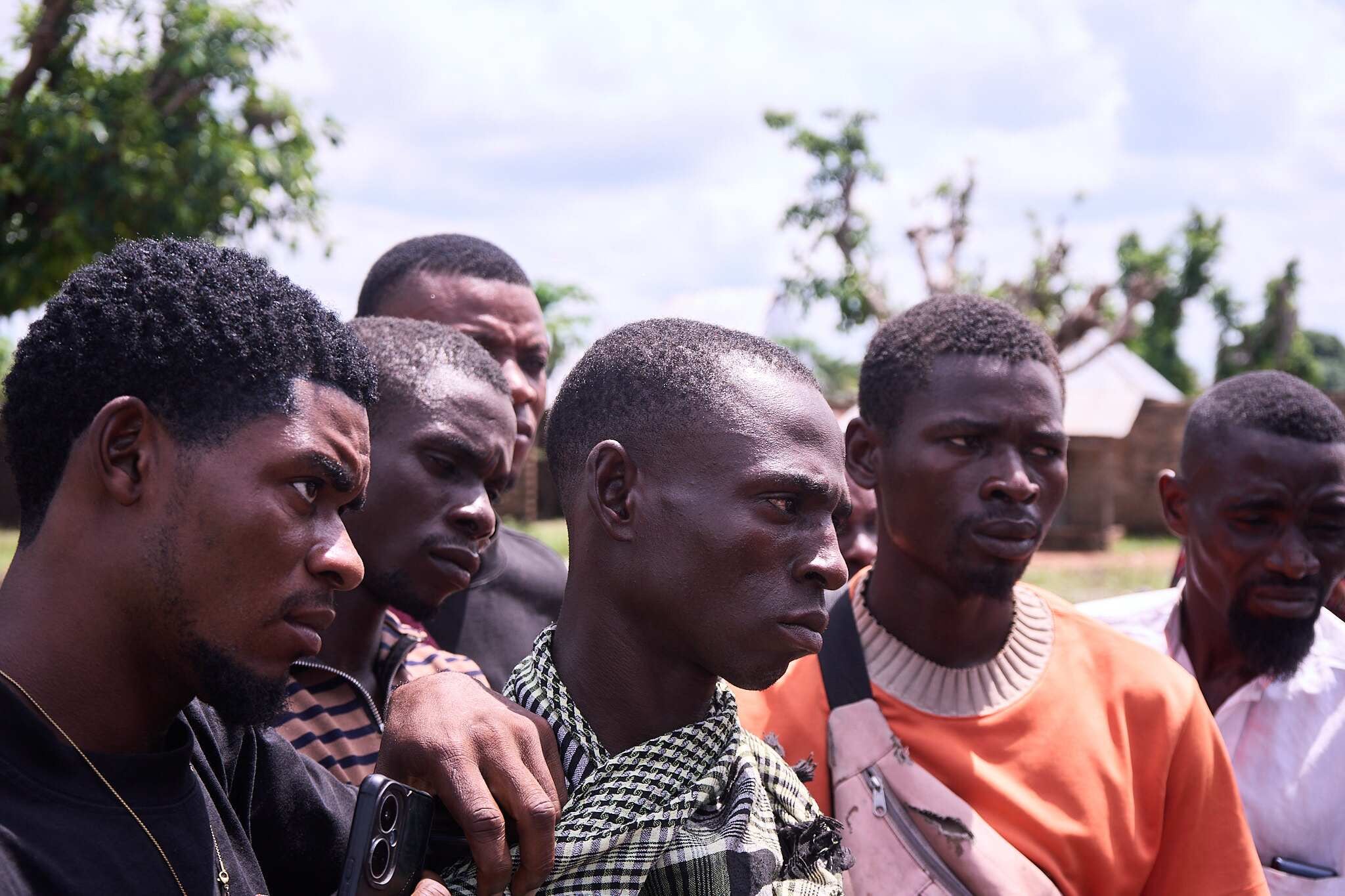 Survivors and village residents in Yelwata Village, central Nigeria after the attacks in mid-June.