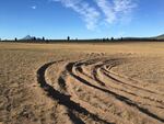 Evan Metz of Grants Pass, Oregon, left ruts 12 inches deep in the Pumice Desert area of Crater Lake National Park, as seen in this undated photo. Parks officials fined Metz $200 for more than $60,000 in damage.