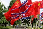 A street is decorated with the flags of China and North Korea in Pyongyang, on Monday, June 8, 2026.