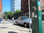 Thousands of Oregon drivers may soon be able to get their driver's licenses again after Gov. Tina Kotek announced she plans to forgive uncollected traffic fines and fees standing in the way. Some of that debt stems from unpaid parking tickets in places like downtown Portland, shown here in this July 10, 2014 file photo.