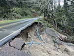 In this photo provided by Oregon State Parks, a landslide undercut Cape Arago Highway and forced two nearby parks to close on Friday, Jan. 3, 2025.