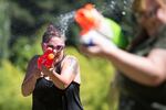 Dozens of people brought their water weapons for the Seventh Annual Water Gun Fight in Laurelhurst Park Sunday, July 30, 2017.