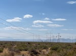 Power lines run through the Utah desert near the hydrogen plant that Chevron and Mitsubishi Power Americas are building.