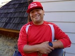 A trip leader from Warm Springs, Jefferson Greene, 39, begins a day of the journey outside the Celilo longhouse in Celilo Village, Ore., on July 19, 2023.