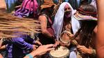 People dance and drum at the rainbow gathering, Herber City, Utah, July 14, 2014.