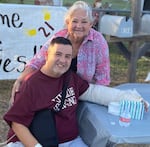 Teacher Arnulfo Reyes and his mother Rosemary Reyes attend an event honoring his return from the hospital after the shooting at Robb Elementary School in Uvalde, Texas.