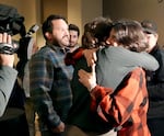 U.S. Rep. Marie Gluesenkamp Perez, right, hugs a supporter at her election night party held at the Hilton in Vancouver, Wash., Nov. 5, 2024.