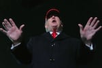 President Donald Trump speaks with reporters at Joint Base Andrews, Md., Sunday, April 12, 2026, after he returned from Miami.