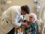 Dr. Richard Clark, a cardiologist from the Sanford Cardiovascular Institute, and a team of nurses spend a day each week traveling from their Sioux Falls offices to one of four rural hospitals that do not have cardiologists on staff. He checks a patient’s heartbeat during a monthly visit to Douglas County Memorial Hospital in Armour.